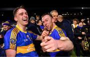 11 December 2021; Clough-Ballacolla players Eoin Doyle, right, and Brian Corby celebrate after their side's victory in the 2021 AIB Leinster Club Senior Hurling Championship Semi-Final match between Clough-Ballacolla and Kilmacud Crokes at MW Hire O'Moore Park in Portlaoise, Laois. Photo by Piaras Ó Mídheach/Sportsfile
