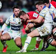 11 December 2021; Marcus Rea of Ulster is tackled by JJ Hanrahan of Clermont Auvergne during the Heineken Champions Cup Pool A match between ASM Clermont Auvergne and Ulster at Stade Marcel-Michelin in Clermont-Ferrand, France. Photo by Julien Poupart/Sportsfile