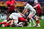 11 December 2021; Damian Penaud of Clermont Auvergne is tackled by Billy Burns of Ulster  during the Heineken Champions Cup Pool A match between ASM Clermont Auvergne and Ulster at Stade Marcel-Michelin in Clermont-Ferrand, France. Photo by Julien Poupart/Sportsfile