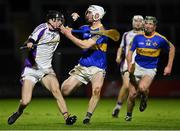 11 December 2021; Cian Ó Cathasaigh of Kilmacud Crokes in action against Eoin Doyle of Clough-Ballacolla during the 2021 AIB Leinster Club Senior Hurling Championship Semi-Final match between Clough-Ballacolla and Kilmacud Crokes at MW Hire O'Moore Park in Portlaoise, Laois. Photo by Piaras Ó Mídheach/Sportsfile
