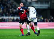 11 December 2021; Duane Vermeulen of Ulster is tackled by Arthur Iturria of Clermont Auvergne during the Heineken Champions Cup Pool A match between ASM Clermont Auvergne and Ulster at Stade Marcel-Michelin in Clermont-Ferrand, France. Photo by Julien Poupart/Sportsfile