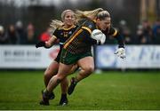 11 December 2021; Monica McGuirk of Meath in action against Katrina Parrock of TG4 Underdogs during the match between Meath and TG4 Underdogs at Donaghmore Ashbourne GAA club in Ashbourne, Meath. Photo by David Fitzgerald/Sportsfile