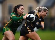 11 December 2021; Vanessa Gallogly of TG4 Underdogs in action against Máire O'Shaughnessy of Meath during the match between Meath and TG4 Underdogs at Donaghmore Ashbourne GAA club in Ashbourne, Meath. Photo by David Fitzgerald/Sportsfile