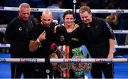 11 December 2021; Katie Taylor with her team, from left, cutman Ian 'Jumbo' Johnson, trainer Ross Enamait and manager Brian Peters after her Undisputed Lightweight Championship bout against Firuza Sharipova at M&S Bank Arena in Liverpool, England. Photo by Stephen McCarthy/Sportsfile