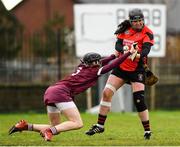 12 December 2021; Una Leacy of Oulart the Ballagh shoots to score her side's first goal past Slaughtneil defender Louise Dougan during the 2020 AIB All-Ireland Senior Club Camogie Championship Semi-Final match between Slaughtneil and Oulart the Ballagh at Donaghmore Ashbourne GAA in Ashbourne, Meath. Photo by Matt Browne/Sportsfile