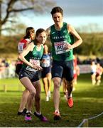 12 December 2021; Siofra Cleirigh Buttner of Ireland takes the batton from team-mate Luke McCann in the Mixed 4x1500m Relay during the SPAR European Cross Country Championships Fingal-Dublin 2021 at the Sport Ireland Campus in Dublin. Photo by Sam Barnes/Sportsfile
