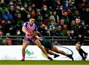 12 December 2021; Paul Champ of Stade Francais is tackled by Alex Wootton of Connacht during the Heineken Champions Cup Pool B match between Connacht and Stade Francais Paris at the Sportsground in Galway. Photo by Harry Murphy/Sportsfile