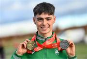 12 December 2021; Darragh Mcelhinney of Ireland with his gold medal, U23 men's team event, and silver medal, U23 Men's, during the SPAR European Cross Country Championships Fingal-Dublin 2021 at the Sport Ireland Campus in Dublin. Photo by Ramsey Cardy/Sportsfile