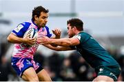 12 December 2021; Nicolas Sanchez of Stade Francais is tackled by Oisin Dowling of Connacht during the Heineken Champions Cup Pool B match between Connacht and Stade Francais Paris at the Sportsground in Galway. Photo by Harry Murphy/Sportsfile