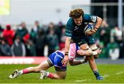 12 December 2021; Cian Prendergast of Connacht is tackled by James Hall of Stade Francais during the Heineken Champions Cup Pool B match between Connacht and Stade Francais Paris at the Sportsground in Galway. Photo by Harry Murphy/Sportsfile