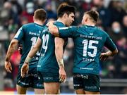12 December 2021; Alex Wootton of Connacht, centre, celebrates after scoring his side's third try with team-mate Oran McNulty, right, during the Heineken Champions Cup Pool B match between Connacht and Stade Francais Paris at the Sportsground in Galway. Photo by Harry Murphy/Sportsfile