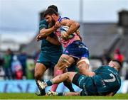 12 December 2021; Marcos Kremer of Stade Francais is tackled by Jarrad Butler and Shane Delahunt of Connacht during the Heineken Champions Cup Pool B match between Connacht and Stade Francais Paris at Sportsground in Galway. Photo by Brendan Moran/Sportsfile