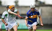 12 December 2021; Ronan Hughes of St Rynaghs in action against Richie Reid of Shamrocks Ballyhale during the AIB Leinster GAA Hurling Senior Club Championship Semi-Final match between St Rynaghs and Shamrocks Ballyhale at Bord na Mona O’Connor Park in Tullamore, Offaly. Photo by Eóin Noonan/Sportsfile