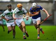 12 December 2021; Ronan Hughes of St Rynaghs in action against Richie Reid of Shamrocks Ballyhale during the AIB Leinster GAA Hurling Senior Club Championship Semi-Final match between St Rynaghs and Shamrocks Ballyhale at Bord na Mona O’Connor Park in Tullamore, Offaly. Photo by Eóin Noonan/Sportsfile