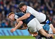 11 December 2021; Ciarán Frawley of Leinster is tackled by Will Stuart and Richard De Carpentier of Bath during the Heineken Champions Cup Pool A match between Leinster and Bath at Aviva Stadium in Dublin. Photo by Brendan Moran/Sportsfile