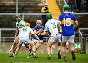 12 December 2021; Ronan Hughes of St Rynaghs in action against Richie Reid of Shamrocks Ballyhale during the AIB Leinster GAA Hurling Senior Club Championship Semi-Final match between St Rynaghs and Shamrocks Ballyhale at Bord na Mona O’Connor Park in Tullamore, Offaly. Photo by Eóin Noonan/Sportsfile