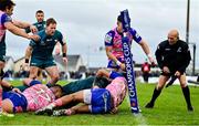 12 December 2021; Cian Prendergast of Connacht, partially hidden, scores his side's sixth try during the Heineken Champions Cup Pool B match between Connacht and Stade Francais Paris at Sportsground in Galway. Photo by Brendan Moran/Sportsfile