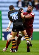 12 December 2021; Daniel Okeke of Munster is tackled by Jimmy Gopperth of Wasps during the Heineken Champions Cup Pool B match between Wasps and Munster at Coventry Building Society Arena in Coventry, England. Photo by Stephen McCarthy/Sportsfile