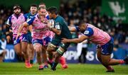 12 December 2021; Jarrad Butler of Connacht is tackled by Loic Godener, left, and Moses Alo Emile of Stade Francais during the Heineken Champions Cup Pool B match between Connacht and Stade Francais Paris at Sportsground in Galway. Photo by Brendan Moran/Sportsfile