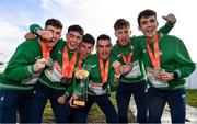 12 December 2021; Team Ireland, from left, Jamie Battle, Darragh McElhinney, Michael Power, Keelan Kilrehill, Donal Devane and Thomas Devaney celebrate with their gold medals after the medal ceremony for the U23 Men's 8000m team event during the SPAR European Cross Country Championships Fingal-Dublin 2021 at the Sport Ireland Campus in Dublin. Photo by Ramsey Cardy/Sportsfile