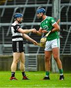 12 December 2021; Midleton captain Conor Lehane and Kilmallock captain Philip O'Loughlin exchange a handshake after the AIB Munster GAA Hurling Senior Club Championship Semi-Final match between Kilmallock and Midleton at TUS Gaelic Grounds in Limerick. Photo by Diarmuid Greene/Sportsfile