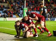 12 December 2021; Patrick Campbell of Munster is congratulated by team-mates after scoring his side's second try during the Heineken Champions Cup Pool B match between Wasps and Munster at Coventry Building Society Arena in Coventry, England. Photo by Stephen McCarthy/Sportsfile