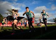 12 December 2021; Andrew Coscoran, left, takes the baton from Síofra Cléirigh Büttner of Ireland in the Mixed Relay final during the SPAR European Cross Country Championships Fingal-Dublin 2021 at the Sport Ireland Campus in Dublin. Photo by Ramsey Cardy/Sportsfile
