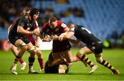 12 December 2021; Dave Kilcoyne of Munster is tackled by Thomas Young, right, and Sam Wolstenholme of Wasps during the Heineken Champions Cup Pool B match between Wasps and Munster at Coventry Building Society Arena in Coventry, England. Photo by Stephen McCarthy/Sportsfile