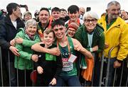 12 December 2021; Darragh McElhinney of Ireland celebrates with his family and friends after winning silver in the U23 Men's 8000m during the SPAR European Cross Country Championships Fingal-Dublin 2021 at the Sport Ireland Campus in Dublin. Photo by Sam Barnes/Sportsfile