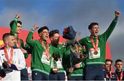12 December 2021; Team Ireland, from left, Thomas Devaney, Darragh McElhinney, Keelan Kilrehill, Donal Devane, Jamie Battle, and Michael Power celebrate with their gold medals during the medal ceremony for the U23 Men's team event at the SPAR European Cross Country Championships Fingal-Dublin 2021 at the Sport Ireland Campus in Dublin.  Photo by Ramsey Cardy/Sportsfile
