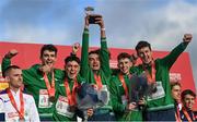 12 December 2021; Team Ireland, from left, Thomas Devaney, Darragh McElhinney, Keelan Kilrehill, Donal Devane, Jamie Battle, and Michael Power celebrate with their gold medals during the medal ceremony for the U23 Men's team event at the SPAR European Cross Country Championships Fingal-Dublin 2021 at the Sport Ireland Campus in Dublin.  Photo by Ramsey Cardy/Sportsfile