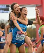 12 December 2021; Nadia Battocletti of Italy celebrates with team-mate Anna Arnaudo, top, after winning the U23 Women's 6000m during the SPAR European Cross Country Championships Fingal-Dublin 2021 at the Sport Ireland Campus in Dublin.  Photo by Ramsey Cardy/Sportsfile