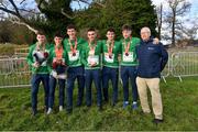 12 December 2021; The Ireland Under 23 Men's team with Sport Ireland chief executive John Treacy during the SPAR European Cross Country Championships Fingal-Dublin 2021 at the Sport Ireland Campus in Dublin. Photo by Ramsey Cardy/Sportsfile