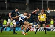 11 December 2021; Orlando Bailey of Bath kicks under pressure from Tadhg Furlong of Leinster during the Heineken Champions Cup Pool A match between Leinster and Bath at Aviva Stadium in Dublin. Photo by Harry Murphy/Sportsfile