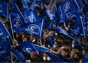 11 December 2021; Leinster supporters wave flags during the Heineken Champions Cup Pool A match between Leinster and Bath at Aviva Stadium in Dublin. Photo by Harry Murphy/Sportsfile