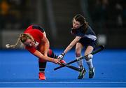 15 December 2021; Bel Collins of Wesley College in action against Izzy Kealy of  Loreto Beaufort during the Leinster Schoolgirls Junior Cup Final match between Wesley College and Loreto Beaufort at the National Stadium in UCD, Dublin. Photo by Eóin Noonan/Sportsfile
