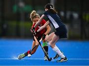 15 December 2021; Kate Woods of Wesley College has a shot on goal despite the effort of Izzy Kealy of Loreto Beaufort during the Leinster Schoolgirls Junior Cup Final match between Wesley College and Loreto Beaufort at the National Stadium in UCD, Dublin. Photo by Eóin Noonan/Sportsfile