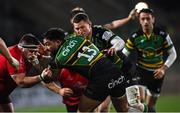 17 December 2021; Matt Proctor of Northampton Saints is tackled by Marty Moore of Ulster during the Heineken Champions Cup Pool A match between Ulster and Northampton Saints at Kingspan Stadium in Belfast. Photo by Ramsey Cardy/Sportsfile