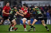 17 December 2021; James Hume of Ulster is tackled by George Furbank, left, and Ollie Sleightholme of Northampton Saints during the Heineken Champions Cup Pool A match between Ulster and Northampton Saints at Kingspan Stadium in Belfast. Photo by Ramsey Cardy/Sportsfile