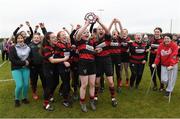 18 December 2021; Arklow captains Ruby Healy, left, and Ruby Neill lift the Plate alongside their team-mates after the Bank of Ireland Leinster Rugby U14 Girls' Plate Final match between Dundalk RFC and Arklow RFC at Carlow IT in Carlow. Photo by Matt Browne/Sportsfile