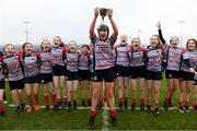 18 December 2021; Mullingar captain Grainne Cleary lifts the cup alongside her team-mates after the Bank of Ireland Leinster Rugby U14 Girls' Cup Final match between Mullingar and Metro 1 at Carlow IT in Carlow. Photo by Matt Browne/Sportsfile