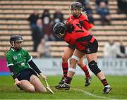 18 December 2021; Sarsfields goalkeeper Laura Glynn saves a shot on goal by Una Leacy of Oulart the Ballagh during the 2020 AIB All-Ireland Senior Club Camogie Championship Final match between Sarsfields and Oulart the Ballagh at UMPC Nowlan Park, Kilkenny. Photo by Eóin Noonan/Sportsfile