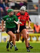 18 December 2021; Réitseal Kelly of Sarsfields in action against Siobhán Sinnott of Oulart the Ballagh during the 2020 AIB All-Ireland Senior Club Camogie Championship Final match between Sarsfields and Oulart the Ballagh at UMPC Nowlan Park, Kilkenny. Photo by Eóin Noonan/Sportsfile