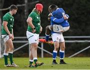 18 December 2021; Italy players David Odiase, 6, and Dewi Passarella celebrate after their victory in the U20's International match between Ireland and Italy at UCD Bowl in Dublin. Photo by Piaras Ó Mídheach/Sportsfile
