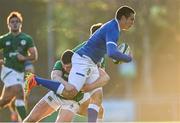 18 December 2021; Francois Carlo Mey of Italy is tackled by Fionn Gibbons of Ireland during the U20's International match between Ireland and Italy at UCD Bowl in Dublin. Photo by Piaras Ó Mídheach/Sportsfile