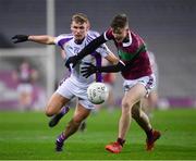 18 December 2021; Callum Pearson of Kilmacud Crokes in action against Cathal Bennett of Portarlington during the AIB Leinster GAA Football Senior Club Championship Semi-Final match between Portarlington and Kilmacud Crokes at Croke Park in Dublin. Photo by Ray McManus/Sportsfile
