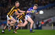 18 December 2021; Dermot Hanifin of Naas races past Sean Keane Caroll of Shelmaliers on his way to score his side's second goal during the AIB Leinster GAA Football Senior Club Championship Semi-Final match between Shelmaliers and Naas at Croke Park in Dublin. Photo by Ray McManus/Sportsfile