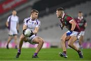 18 December 2021; Callum Pearson of Kilmacud Crokes in action against Patrick O'Sullivan of Portarlington during the AIB Leinster GAA Football Senior Club Championship Semi-Final match between Portarlington and Kilmacud Crokes at Croke Park in Dublin. Photo by Seb Daly/Sportsfile