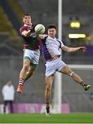 18 December 2021; Sean Byrne of Portarlington in action against Andrew McGowan of Kilmacud Crokes during the AIB Leinster GAA Football Senior Club Championship Semi-Final match between Portarlington and Kilmacud Crokes at Croke Park in Dublin. Photo by Seb Daly/Sportsfile