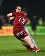 18 December 2021; Benjamin Urdapilleta of Castres Olympique is tackled by Chris Farrell of Munster during the Heineken Champions Cup Pool B match between Munster and Castres Olympique at Thomond Park in Limerick. Photo by David Fitzgerald/Sportsfile